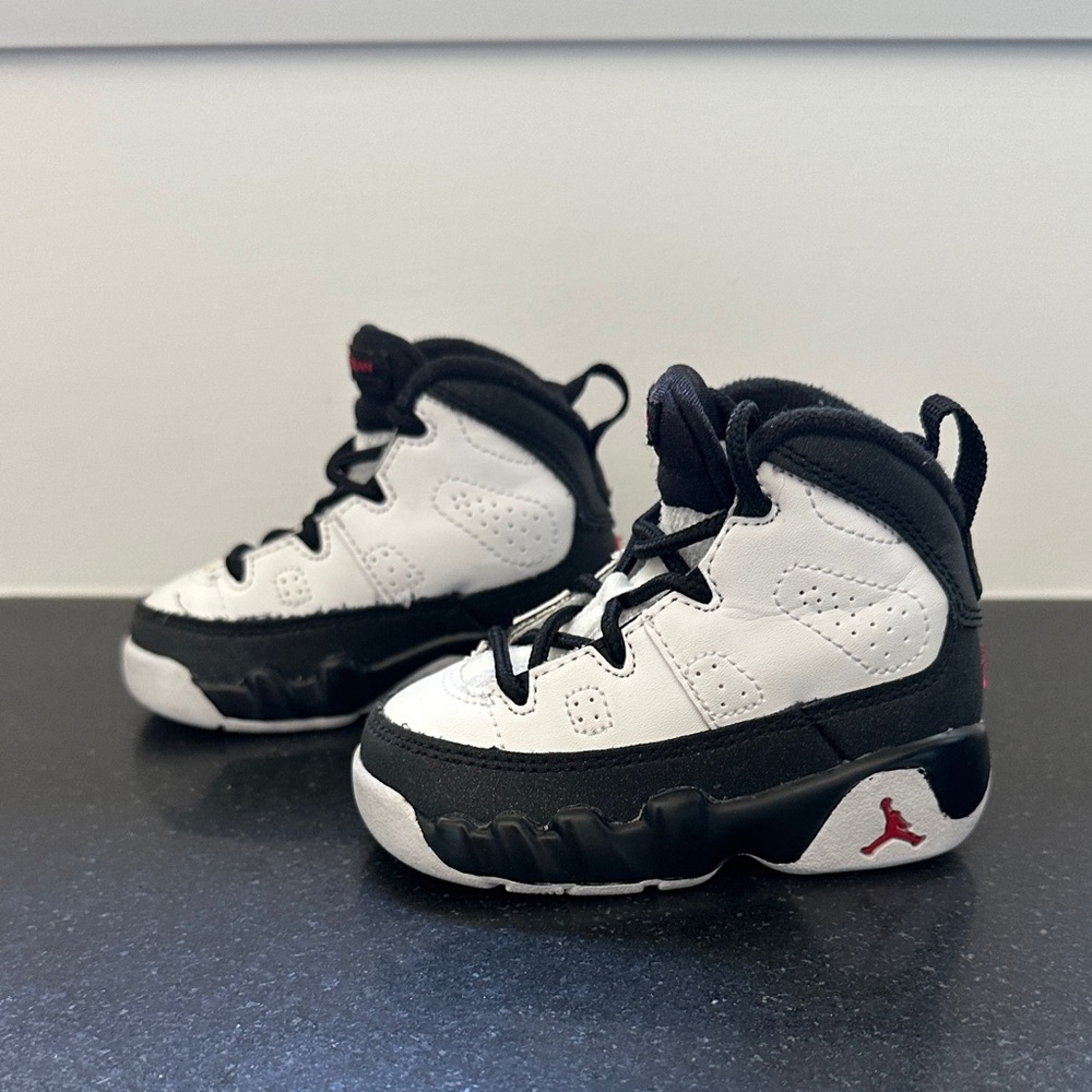 Baby Size 4C Jordan Kids Black and White Sneakers